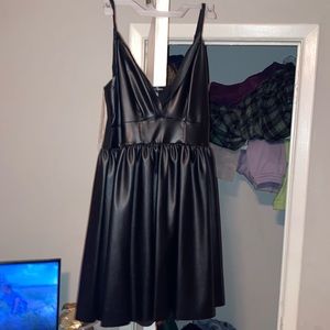 Im selling a leather black dress its cute and very flattering